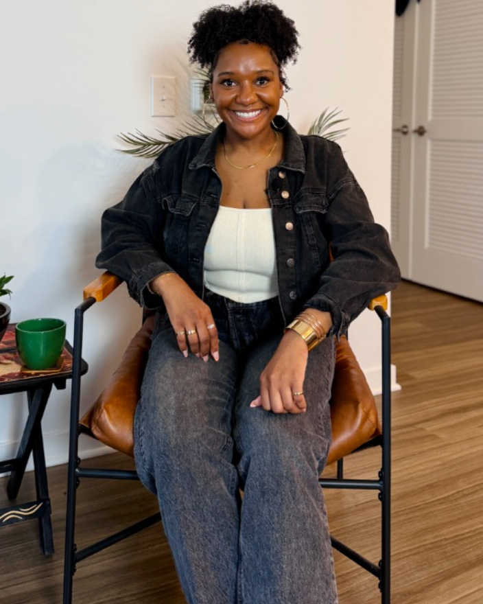 Precious Elam seated at home